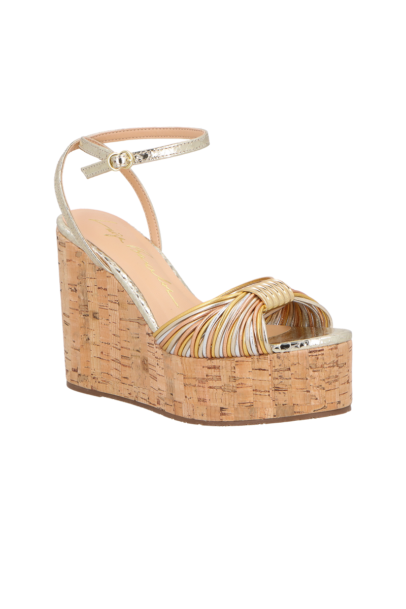 SANDÁLIA PLATAFORMA EM COURO DOURADO COM SOLADO EM CORTIÇA E ENFEITE METÁLICO