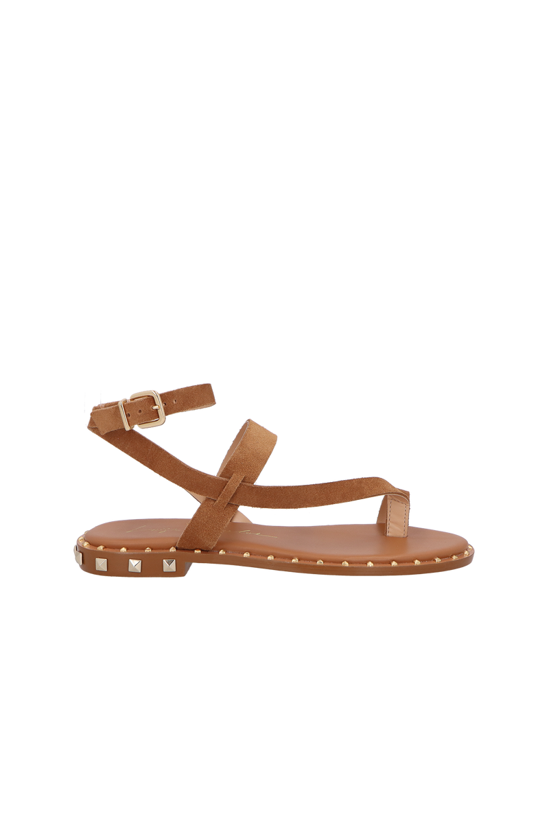 RASTEIRA DE DEDO EM CAMURÇA CARAMELO COM TIRAS CRUZADAS E TACHAS